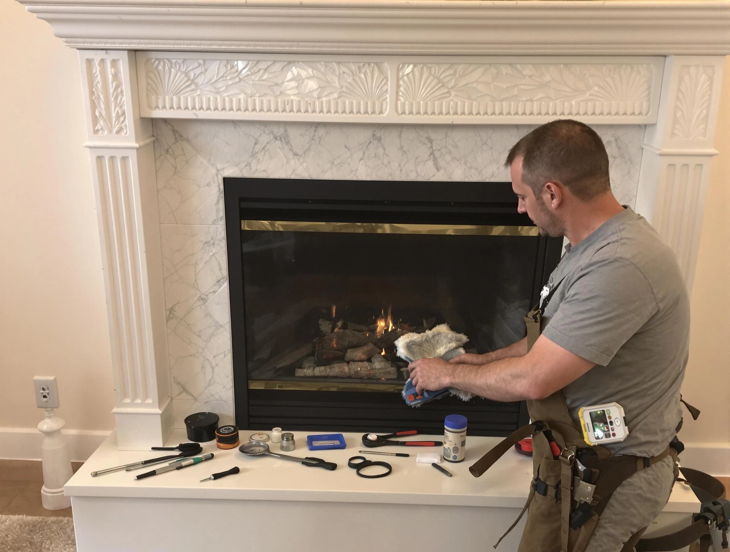 Druid Hills Chimney Sweep performing fireplace maintenance in Druid Hills, GA